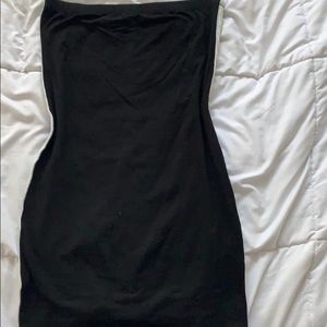 A black tube top with white striping on the sides